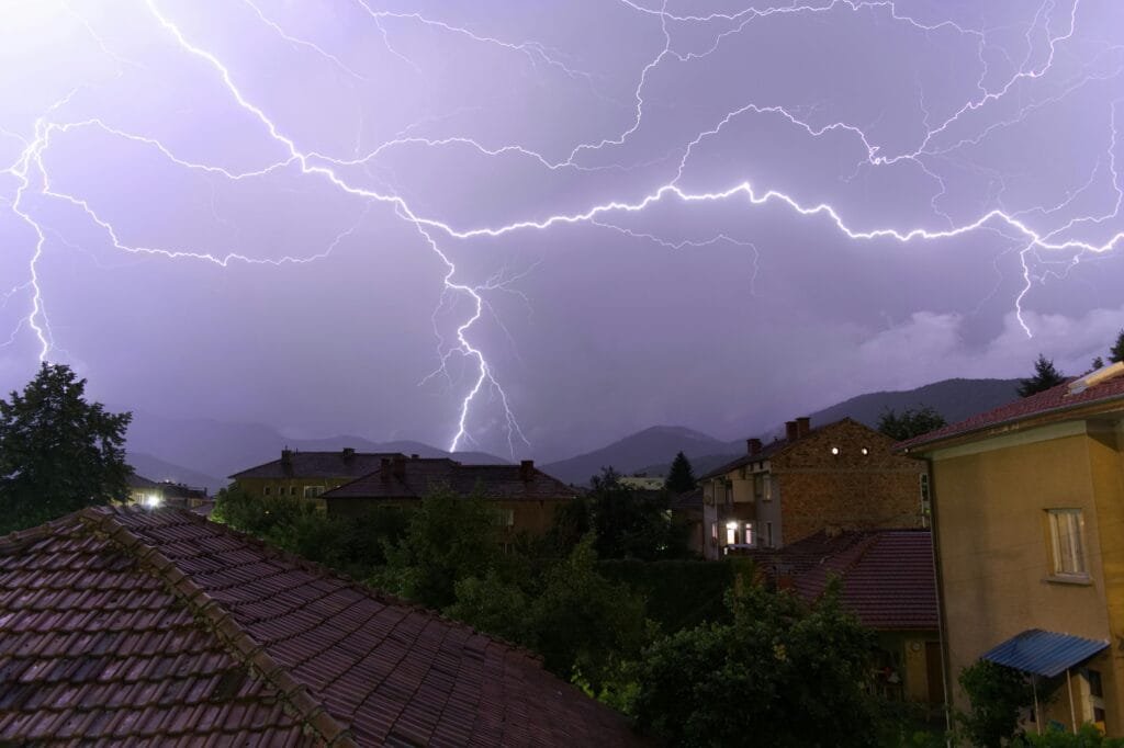 Brown Concrete House Under Lightning